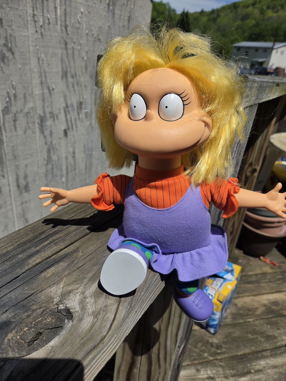 This is a vintage 1993 Dakin Nickelodeon Angelica Pickles doll with a vinyl head